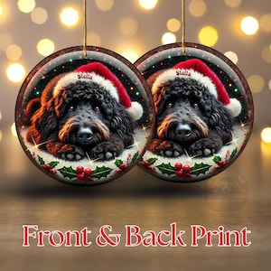 Black bernedoodle or labradoodle dog ceramic ornament show hanging with a gold string.  The ornament measures 3 inches in diameter and is a full gloss, printed on both sides.