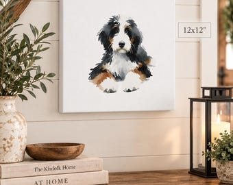 May include: A square canvas wall art print featuring a watercolor illustration of a Bernese Mountain Dog puppy with black, white, and tan fur. The artwork is labeled with the dimensions 12x12 inches, showing the puppy in a seated position.