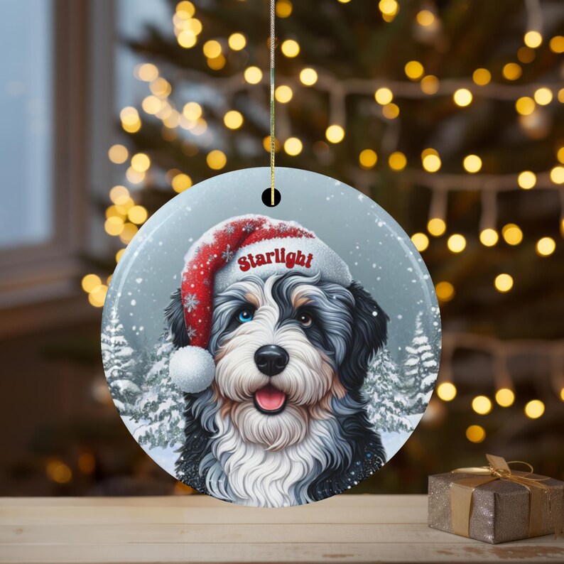 Merle Bernedoodle Ceramic Ornament, showcasing stunning blue and brown eyes. Personalized ornament with your dogs name