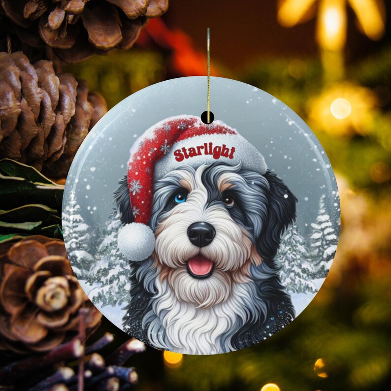 Merle Bernedoodle Ceramic Ornament, showcasing stunning blue and brown eyes. Personalized ornament with your dogs name