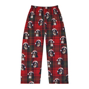 Men's pajama pants lounge wear personalized Christmas pajama bottoms with Bernese Mountain dogs wearing Santa Hat and their name is on the Santa Hat.  Bernese Mountain Dog dad gear!
