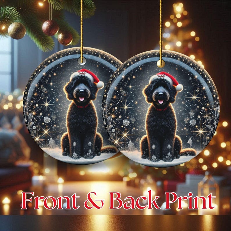 May include: Two round Christmas ornaments featuring a black dog wearing a Santa hat and red collar. The ornaments have a winter scene background with snowflakes and stars. The text "Front & Back Print" is at the bottom.