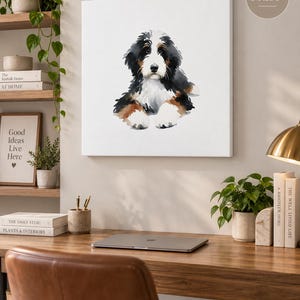 Puede incluir: Un lienzo cuadrado con una ilustraci&oacute;n en acuarela de un cachorro de boyero de Berna con pelaje negro, blanco y marr&oacute;n. La obra de arte est&aacute; etiquetada con el texto 30x30 pulgadas en la esquina superior derecha de la imagen.
