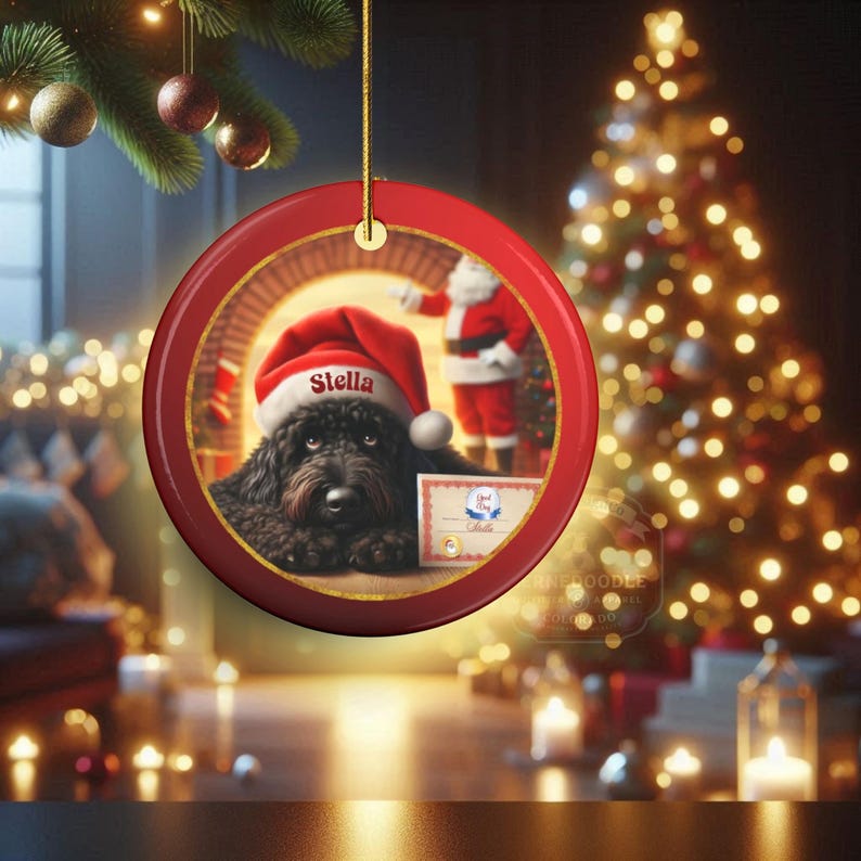 This ceramic ornament features a cute black goldendoodle (or Labradoodle)...Or black bernedoodle dog wearing a Santa hat and being on their best behavior for Santa, surrounded by holiday decorations.  Three inch ceramic dog ornament with a black bernedoodle black golden doodle black goldendoodle dog wearing a santa hat on this cute dog ornament gift.  Perfect ornament for a dog person, dog lover, doodle mom or doodle dad.