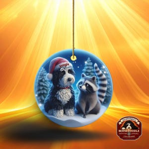 A 3-inch double-sided ceramic Christmas ornament featuring an adorable claymation-style Bernedoodle wearing a red Santa hat personalized  sitting beside a cute raccoon under a snowy winter night sky. The ornament has crisp detailing, soft blue tones, and a warm Christmas glow in the blurred background. Perfect for Bernedoodle lovers, handmade Christmas gift shoppers. High-quality ceramic with vibrant colors, ideal for tree decorating, pet memorial ornaments, or festive seasonal displays.
