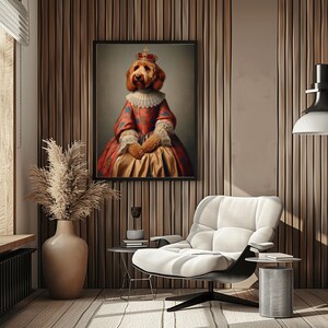 May include: A framed portrait of a dog dressed in regal attire, including a crown and a red and gold gown. The artwork hangs on a wood-paneled wall above a modern white armchair, creating a blend of classic and contemporary styles.