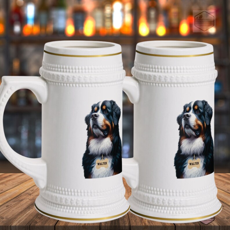 May include: Two white ceramic beer steins with gold trim and handles. Each stein features a portrait of a Bernese Mountain Dog with a tag that reads "WALTER". The background is blurred, suggesting a bar setting.