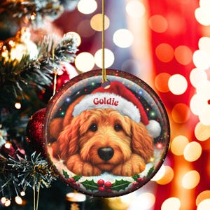 Ceramic golden doodle goldendoodle doodle dog ornament with impressive snow globe style design on both sides.  Excellent doodle mom gift.  Goldendoodle holiday heirloom gift and Christmas Tree Ornament!