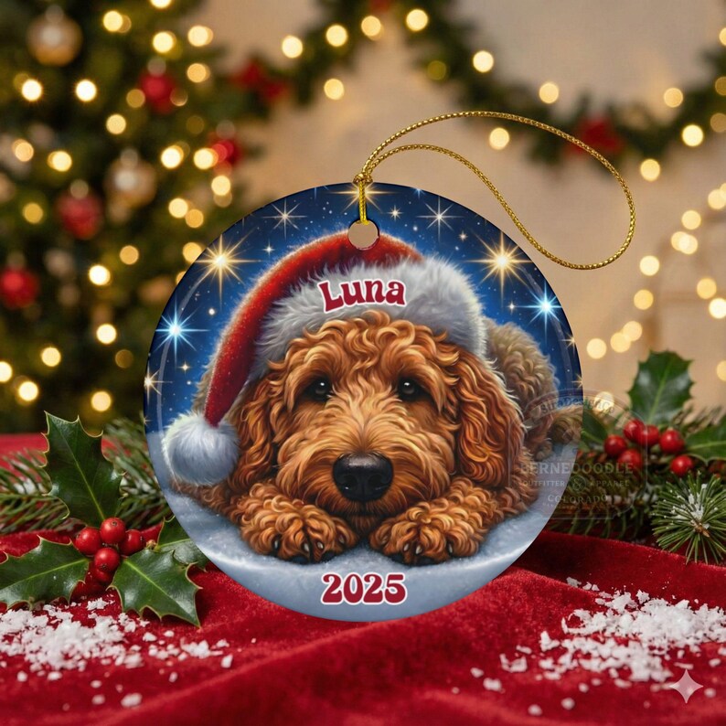 A ceramic ornament of a goldendoodle dog wearing a Santa hat, personalized with the dog's name and the year.  Gorgeously placed in a warm background with candles and Christmas lights.