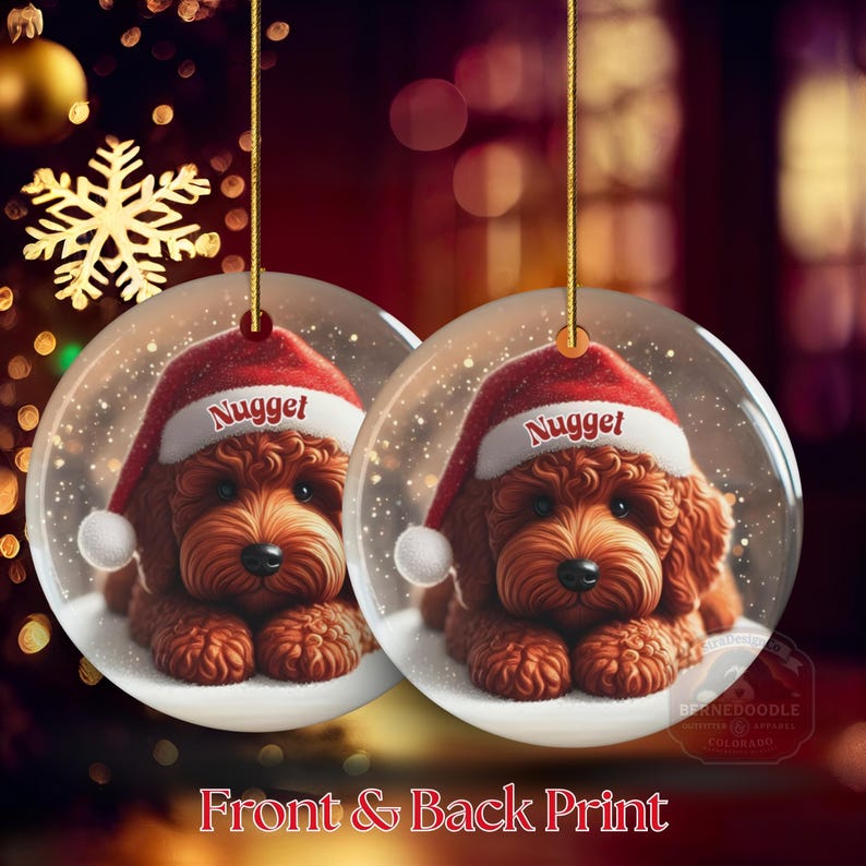 This ceramic ornament features a cute red mini-doodle golden doodle or goldendoodle dog wearing a Santa hat in a snow globe setting, surrounded by holiday decorations. Perfect for adding a festive touch to your Christmas tree or as a thoughtful gift for dog lovers.