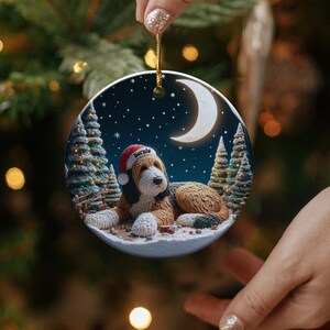 Christmas puppy ornament, cute dog holiday decoration, festive tree decor, moonlit night scene, winter wonderland charm