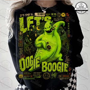 May include: A black long-sleeve shirt featuring a large, vibrant green graphic of Oogie Boogie. The design includes dice, a haunted house, ghosts, and text that reads: IT'S TIME TO LET'S OOGIE BOOGIE, HE'S MR. OOGIE BOOGIE, and other various graphic elements.