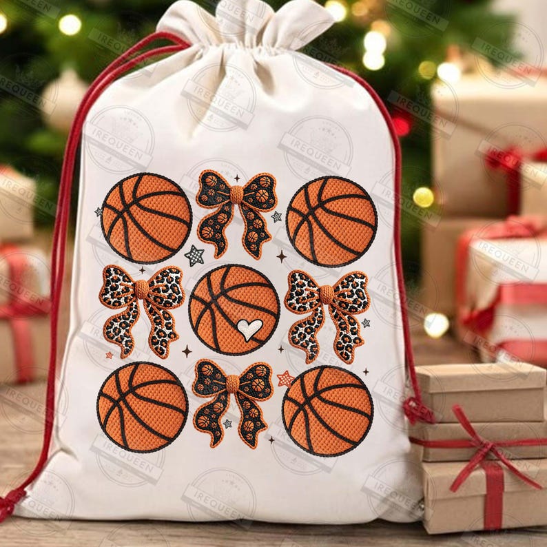 May include: A white drawstring gift bag featuring orange basketballs and decorative bows. The bows have a leopard print design. The bag has a red drawstring closure and is decorated with small stars and a heart.