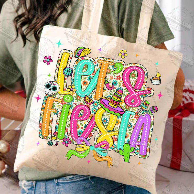 May include: A beige tote bag featuring the phrase "Let's Fiesta" in vibrant, playful lettering. The design incorporates a sombrero, maracas, and other celebratory illustrations, ideal for a party.