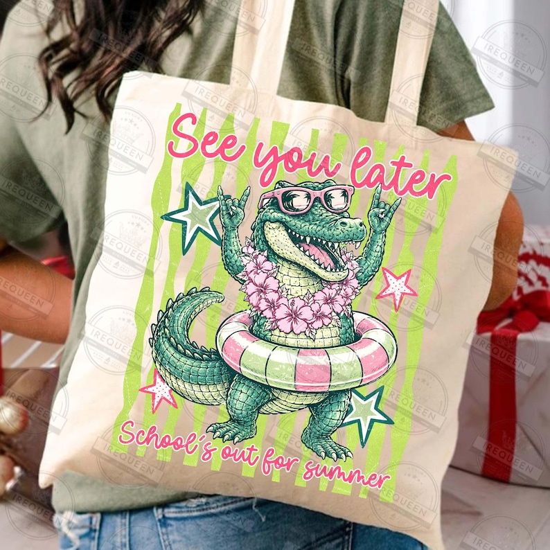 May include: A beige tote bag featuring a cartoon alligator wearing sunglasses and a floral lei, inside a pink and green striped inner tube. Text reads "See you later" and "School's out for summer" in pink.