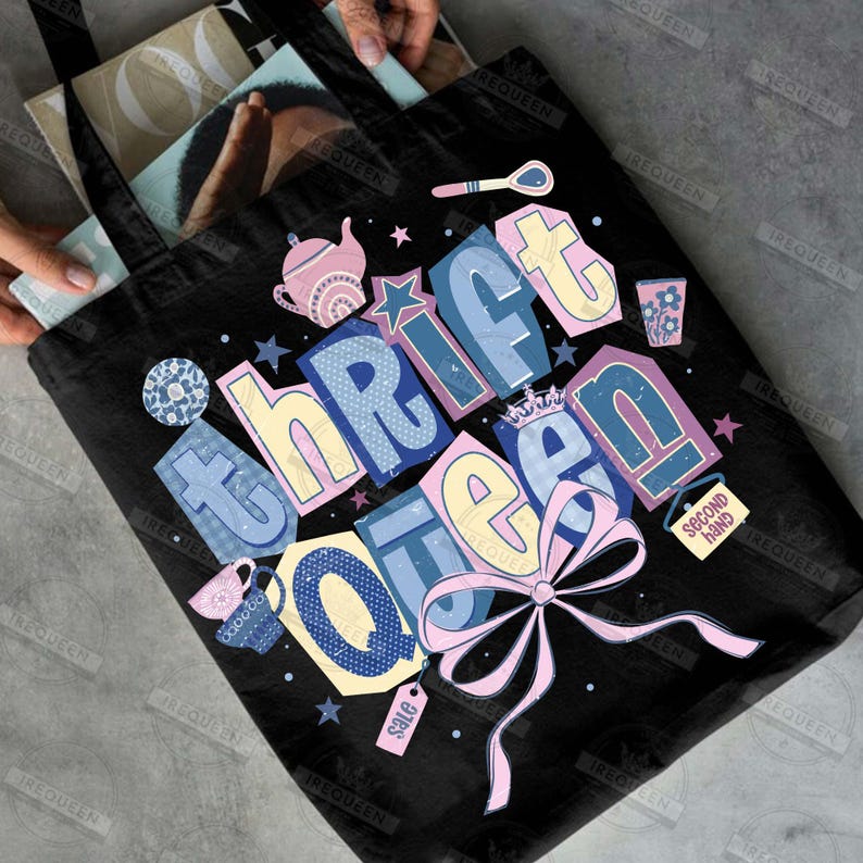 May include: Black tote bag with the words "Thrift Queen" in colorful, block letters. The design includes a pink bow, stars, and illustrations of a teapot, teacup, and spoon. A "Second Hand" tag and a "Sale" tag are also visible.