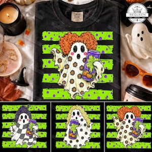 May include: A black t-shirt featuring a graphic of a ghost with orange curly hair, holding a purple can with green liquid. The ghost is patterned with small orange flowers and is set against a background of horizontal lime green stripes with purple dots.