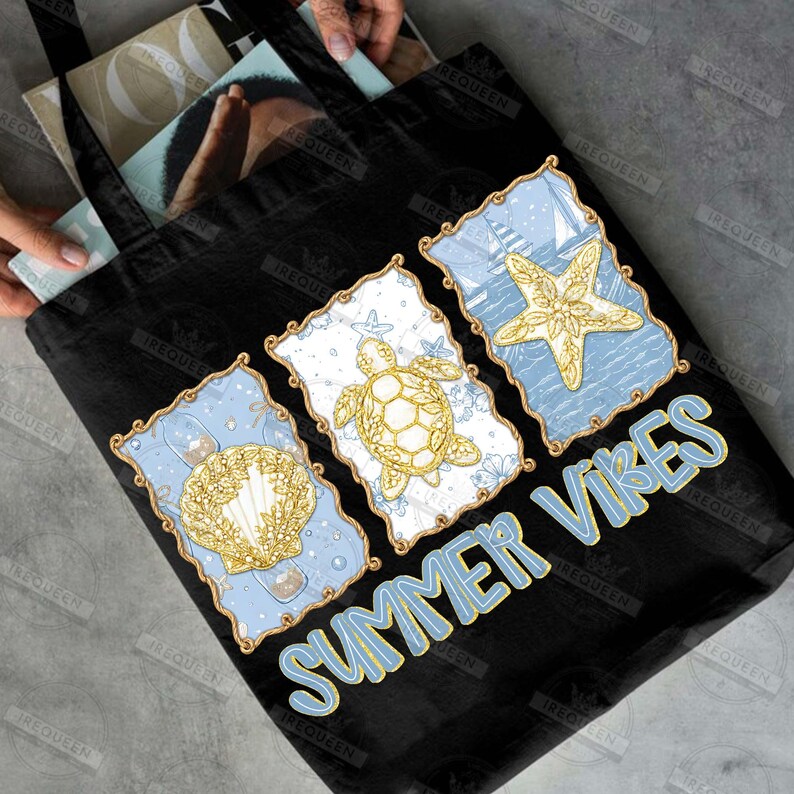 May include: Black tote bag featuring three rectangular designs with a seashell, turtle, and starfish. Each design has a gold outline and is set against a blue and white background. The words "SUMMER VIBES" are printed in blue and yellow.
