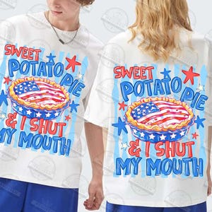 May include: White t-shirts with a graphic design featuring a sweet potato pie with an American flag design. The text reads "SWEET POTATO PIE & I SHUT MY MOUTH" in blue and red. The design includes stars and stripes.