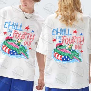 May include: White t-shirts with a graphic design featuring a cartoon alligator wearing sunglasses and a red hat, floating on a patriotic inner tube, with the text "Chill the Fourth Out".