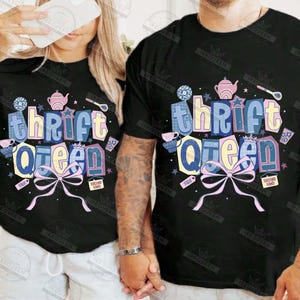 May include: Black t-shirts with the text "thrift Queen" in a colorful, whimsical design. The design includes a bow, stars, and illustrations of a teapot, teacups, and other thrift store-related items. The words "sale" and "second hand" are also included.
