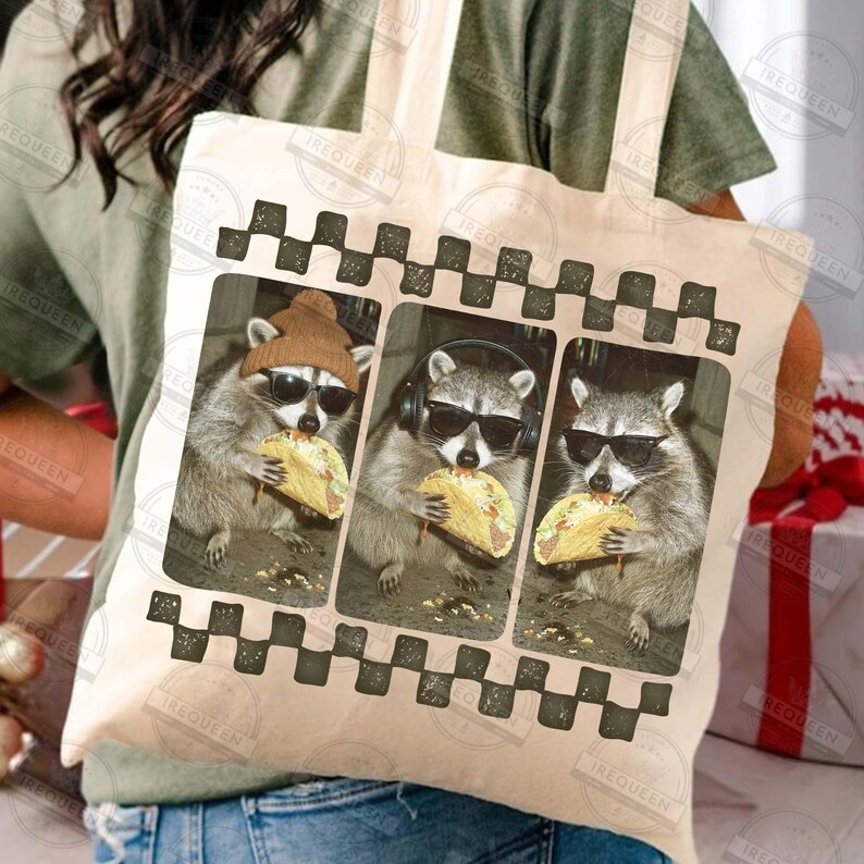 May include: A beige tote bag with three raccoon illustrations, each wearing sunglasses and eating a taco. One raccoon wears a brown beanie, another headphones. The bag has a black and white checkered border.