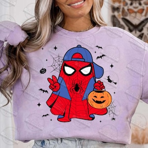 Pode incluir: Um moletom roxo claro com um design de fantasma do Homem-Aranha com tema de Halloween. O design inclui um fantasma vermelho e azul usando um bon&eacute; de beisebol azul, segurando uma ab&oacute;bora e fazendo um sinal de paz. Morcegos pretos, teias de aranha e uma bruxa tamb&eacute;m est&atilde;o inclu&iacute;dos.