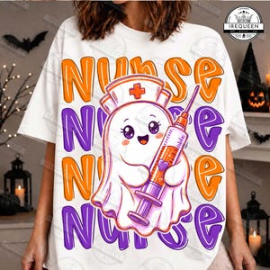 May include: A white t-shirt featuring a graphic of a cartoon ghost wearing a nurse cap and holding a syringe. The word NURSE is repeated in large, bold orange and purple bubble letters across the background. A logo in the corner reads IREQUEEN.