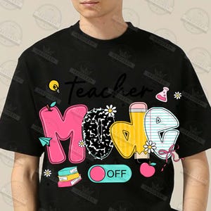 May include: Black t-shirt with a graphic design that says "Teacher Mode Off". The graphic features a lightbulb, an apple, a pencil, a beaker, and a light switch.