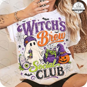 May include: A white t-shirt featuring a graphic print with the text Witch's Brew Social Club. The design includes a ghost wearing a purple beanie, a purple cauldron with green liquid, a jack-o'-lantern, a tombstone, and spider web accents.