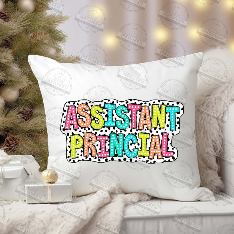 May include: White pillow with a colorful polka dot design that says "Assistant Principal" in a bold, colorful font.