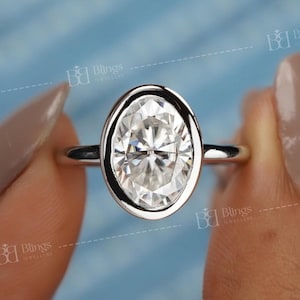 Anel de moissanita com aro oval, anel de noivado em ouro branco 10K, anel de casamento com aro, oval alongado, anel solitário com aro, presente para ela