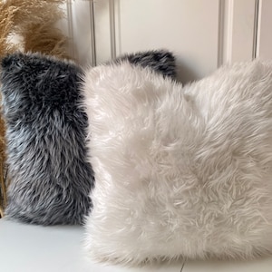 Black and white fur pillows hotsell