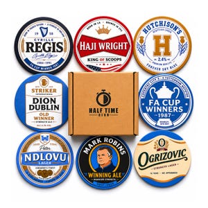 May include: A set of eight circular drink coasters featuring various sports-themed graphic designs and text, arranged around a central square cardboard box labelled with the Half Time Club logo and a stopwatch icon.