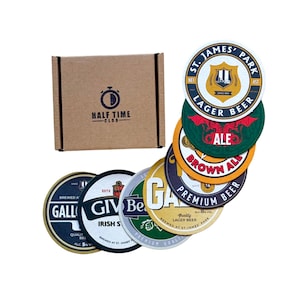 May include: A set of six round beer coasters with different designs. The coasters feature various beer brands and logos, including "St. James' Park Lager Beer", "Brown Ale", "Gallagher's Irish Stout", and "Give Us A Beer". The coasters are made of a thick, absorbent material and are perfect for protecting surfaces from spills.