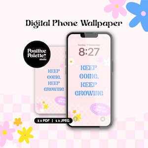 May include: Digital phone wallpaper with a pink background and the words "KEEP GOING, KEEP GROWING" in blue. The phone displays the time and date. The image includes floral accents and the text "Positive Palette studio."