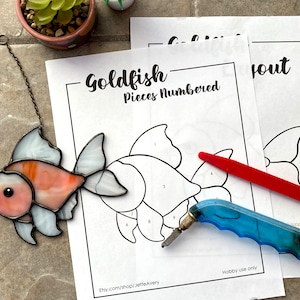 Muster- Goldfisch-Buntglas-Sonnenfänger