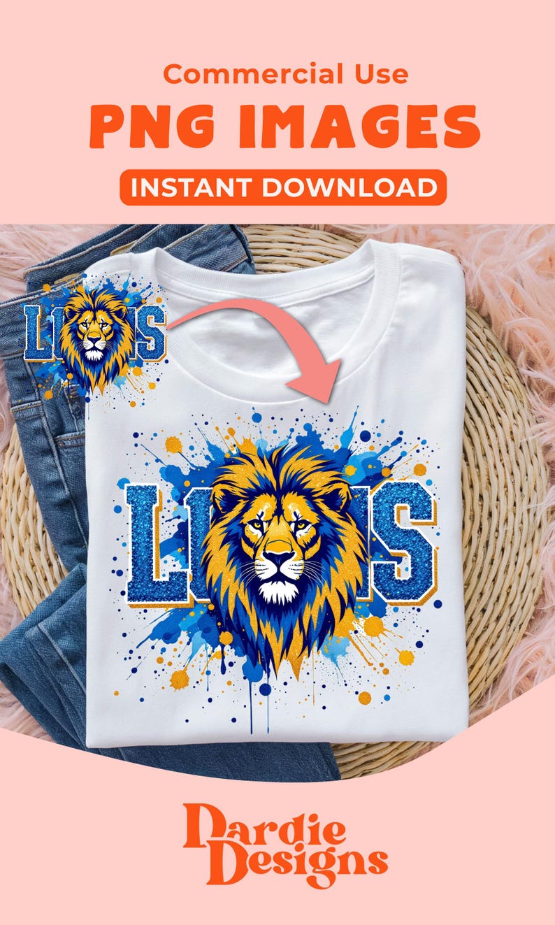 May include: A white t-shirt with a blue and gold lion graphic and the word "Lions" in blue and gold glitter. The graphic is surrounded by blue and gold paint splatters.