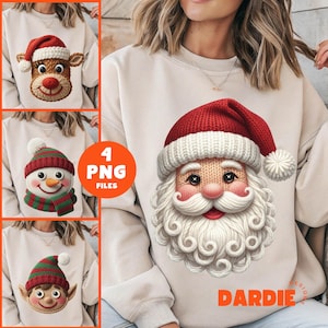 Op de afbeelding: Een beige sweatshirt met een gezicht van de kerstman, een rode muts en een witte baard. De afbeelding toont ook een rendier, een sneeuwpop en een elf-ontwerp. De tekst "4 PNG FILES" is zichtbaar, samen met het woord "DARDIE".