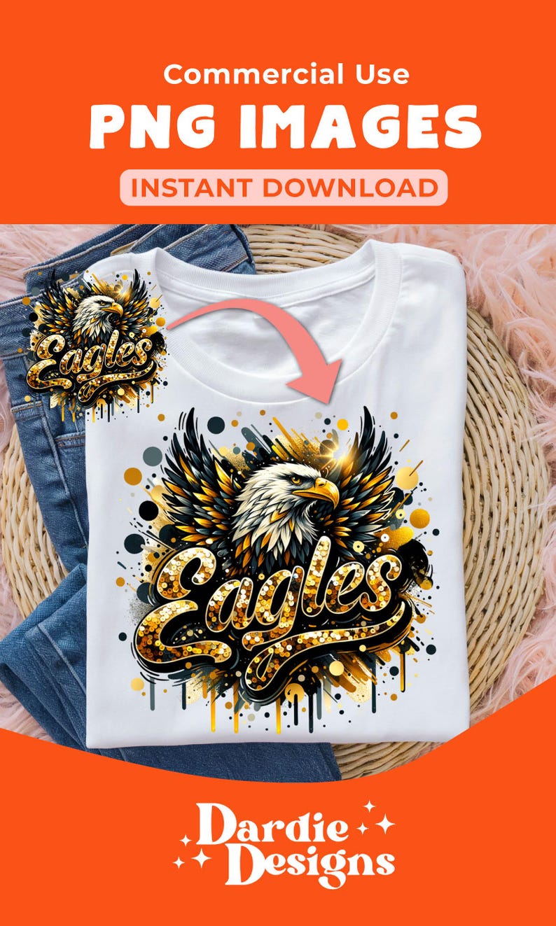 Peut inclure: Un t-shirt blanc avec un motif d'aigle en paillettes dor&eacute;es avec le mot "Eagles" en paillettes dor&eacute;es. Le motif est sur un t-shirt blanc avec un fond noir et or.