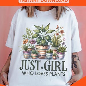 May include: A white t-shirt featuring a graphic of potted plants and the text "Just a girl who loves plants".