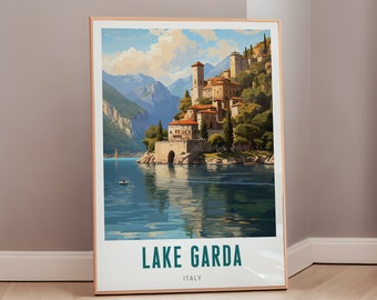 May include: A vintage travel poster featuring a scenic view of Lake Garda in Italy. The poster depicts a picturesque village nestled on a hillside overlooking the lake, surrounded by mountains and lush greenery. The text "LAKE GARDA" and "ITALY" is displayed at the bottom of the poster.