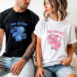 May include: Black and white t-shirts featuring cartoon characters. The black tee has "HER STITCH" above a blue Stitch holding a flower. The white tee has "HIS ANGEL" above a pink Angel character.
