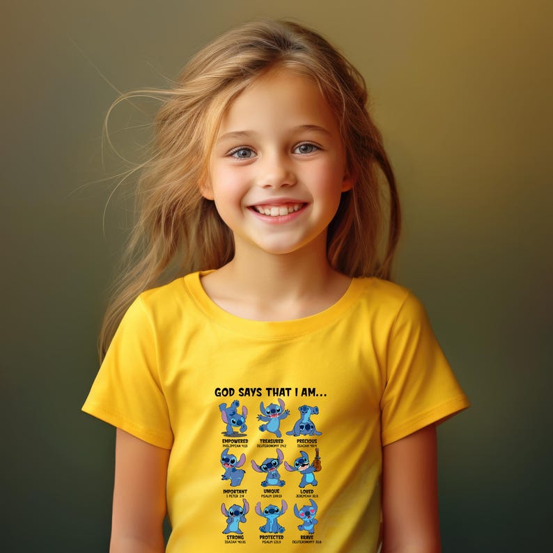 May include: A yellow t-shirt featuring a graphic of the character Stitch from Lilo & Stitch. The shirt has the text "GOD SAYS THAT I AM..." above a series of Stitch illustrations with positive affirmations. The girl is smiling.