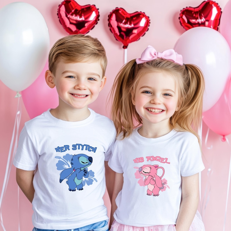 May include: Two children wearing white t-shirts with cartoon character graphics. One shirt says "Her Stitch" with a blue character, and the other says "His Angel" with a pink character. Pink and white balloons and heart-shaped balloons are in the background.