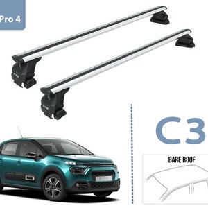 May include: A silver roof rack system, labeled "Pro 4", is shown with two bars and black end caps. The roof rack is designed for a silver Citroen C3 hatchback, labeled "C3", with a bare roof.
