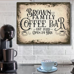 May include: A vintage-style sign for a coffee bar, with the text "Brown Family Coffee Bar - Est 2025 - Open 24 Hrs". The sign has a distressed wood background and features a coffee cup and coffee beans.