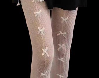 Pair of white fishnet tights with ribbon bows from the Batignolles French Gambettes collection