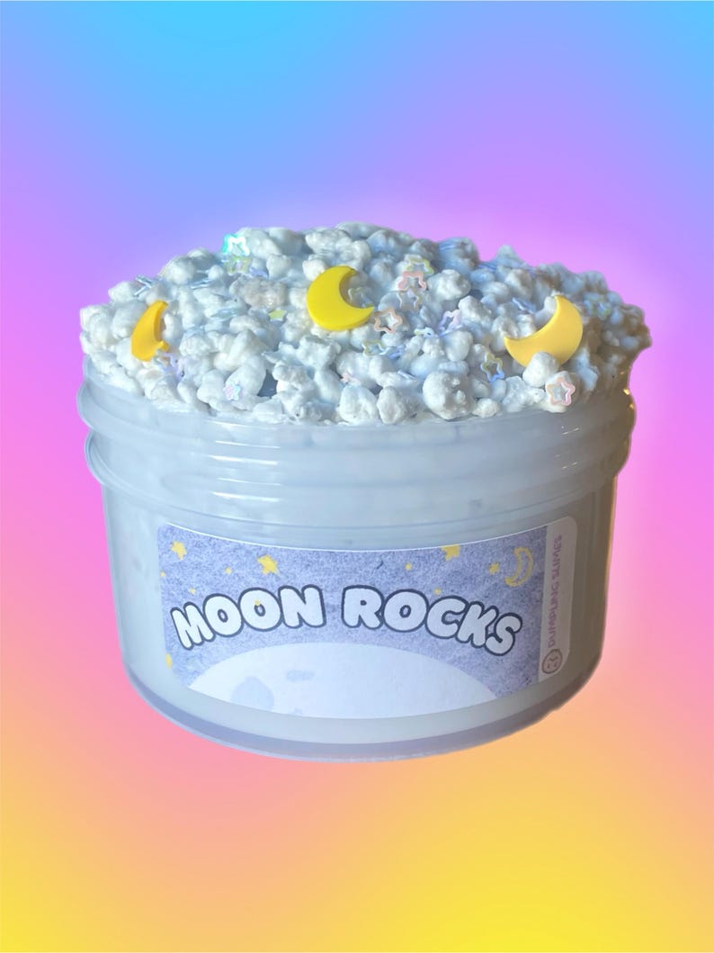 "Clear blue ocean-themed slime with glitter and shell charms, stretchy homemade sensory slime."
"Thick and fluffy rainbow slime with vibrant colors, soft texture, and satisfying stretch."
"Butter slime in pastel yellow color, smooth and spreadable texture, handmade sensory play slime."
"Crunchy slime with colorful foam beads, satisfying texture, handmade sensory toy for stress relief."