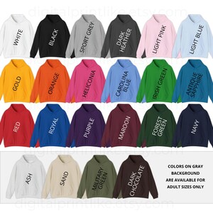 May include: A collection of hooded sweatshirts in various colors, including white, black, red, and blue. Each sweatshirt has a front pocket and a hood with drawstrings. The text on the image indicates the colors available.